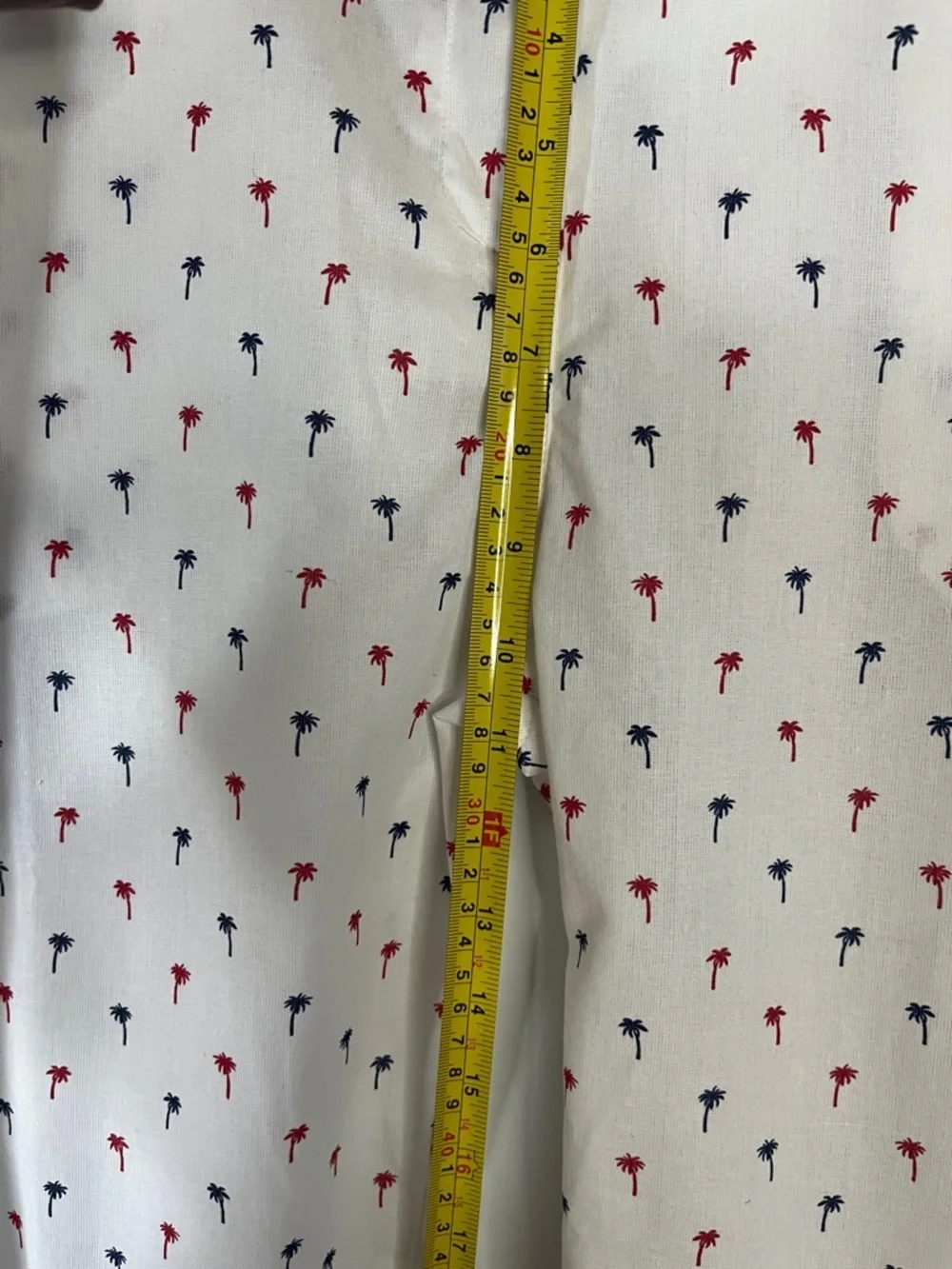 White Cropped Pants with Red & Navy Palm Print w/Ruffled Ties on each leg.  Sz L